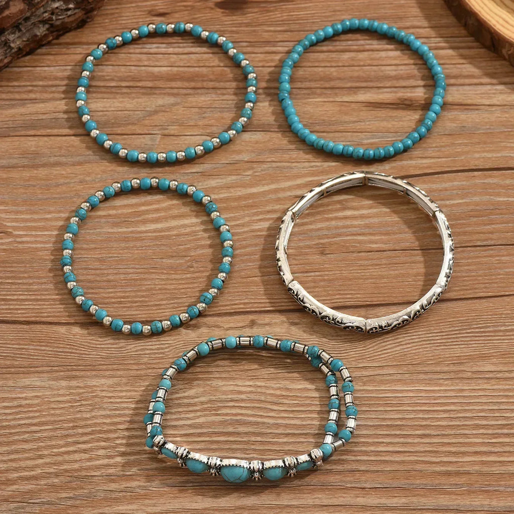 Set di bracciali boho con perle turchesi