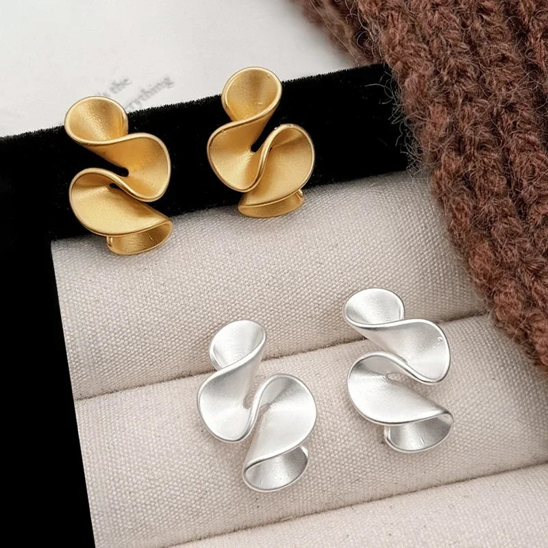 Orecchini in argento e oro 18K