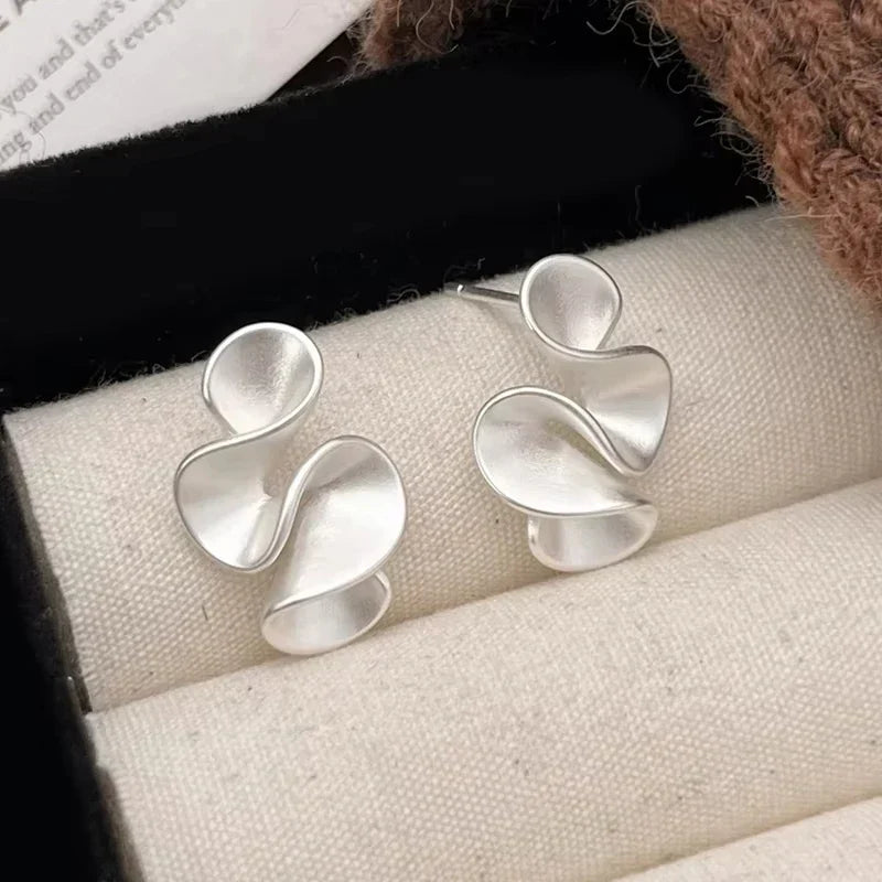 Orecchini in argento e oro 18K