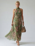 ABITO MIDI HALTER FLOREALE – L'ELEGANZA SENZA TEMPO
