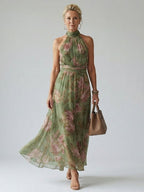 ABITO MIDI HALTER FLOREALE – L'ELEGANZA SENZA TEMPO
