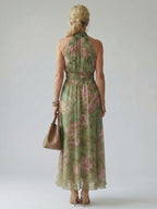 ABITO MIDI HALTER FLOREALE – L'ELEGANZA SENZA TEMPO