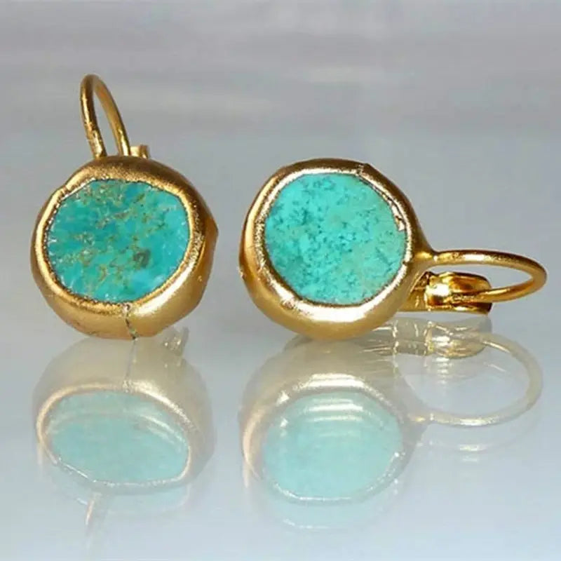 Eleganti orecchini in oro con pietra turchese
