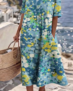 ABITO MIDI FLOREALE ESTATE – LA FRESCHEZZA CHE VESTE BENE